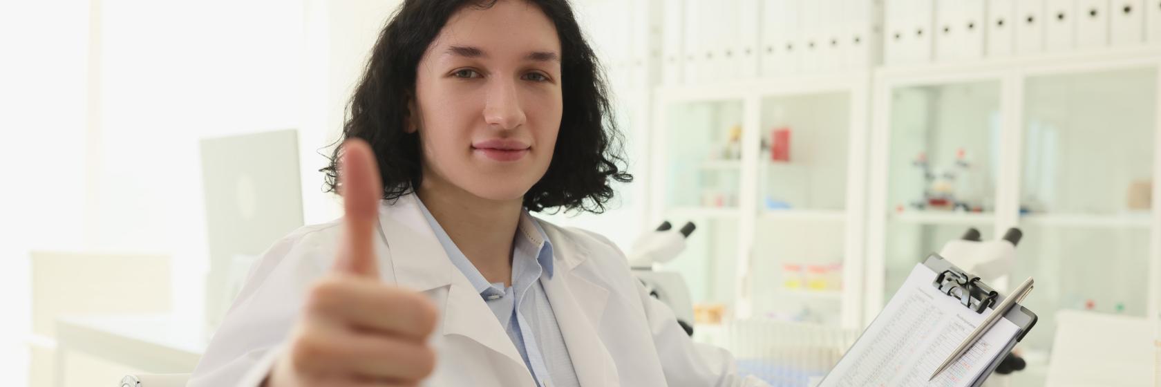 Satisfied Lab Person with Clipboard.jpeg